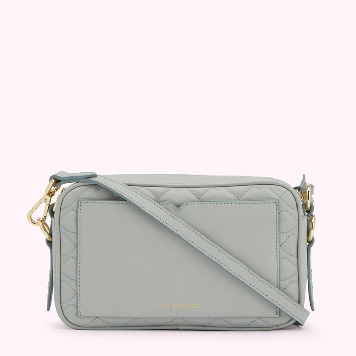 Light blue quilted crossbody bag by Lulu Guinness.