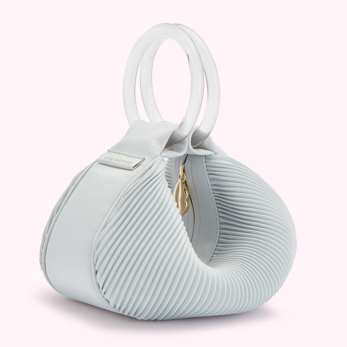 Light blue pleated Lulu Guinness handbag with clear Perspex handles.