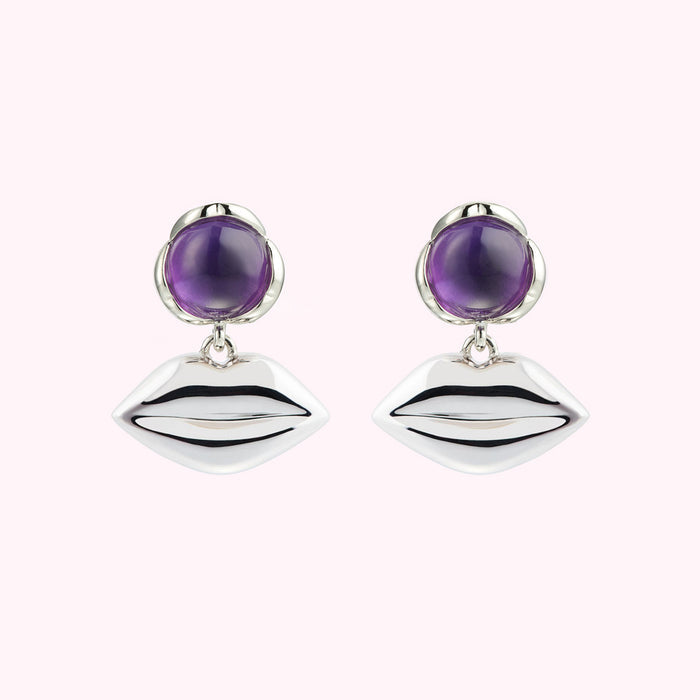 Silver lip earrings with amethyst cabochons.