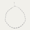 Silver lip chain necklace on a light gray background