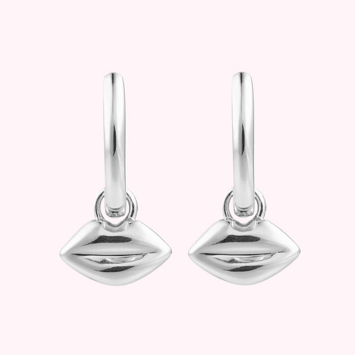 Front image of a pair or sterling silver hoop earrings with lip charms.
