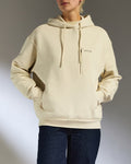 a person wearing a white sweatshirt