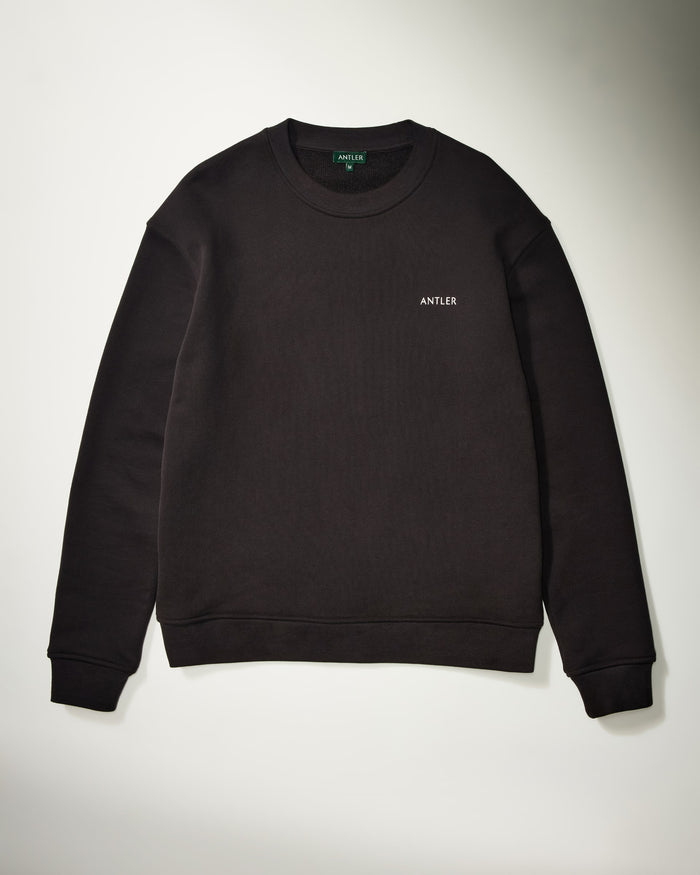 a black sweater on a white background