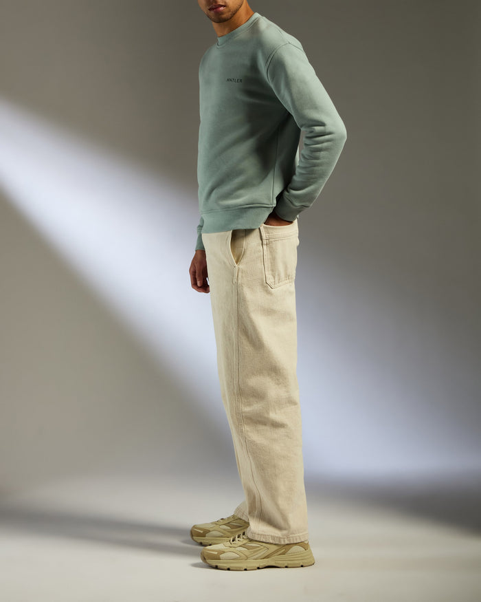a man standing with his hands in his pockets