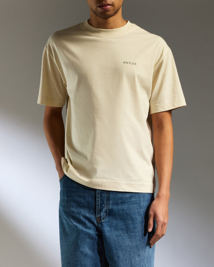 a man wearing a white shirt