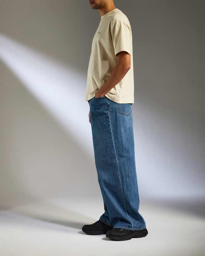 a man standing with his hands in his pockets