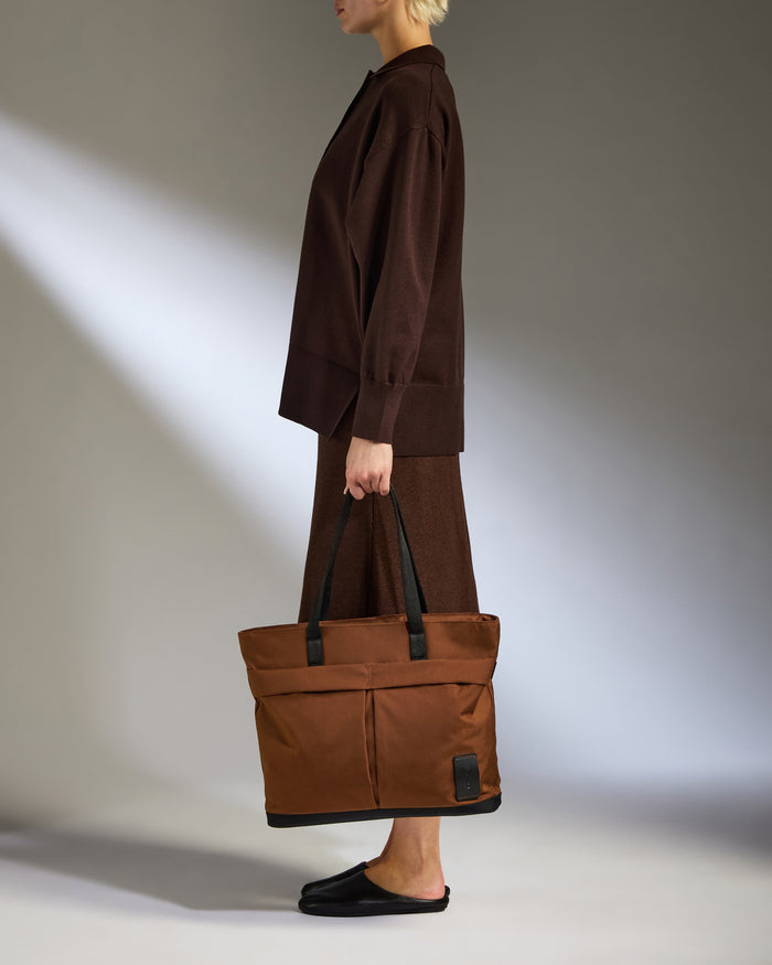 a woman holding a bag