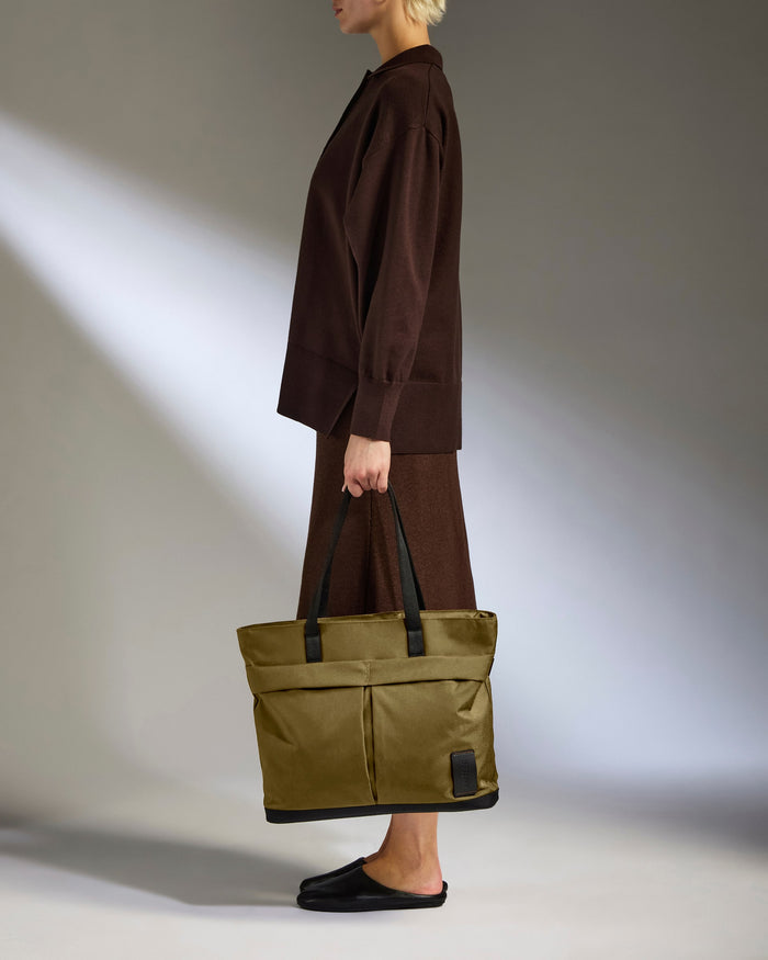 a woman holding a bag