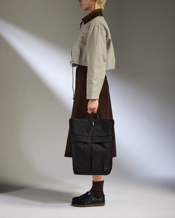 a man holding a bag