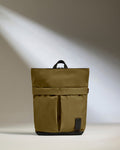 a brown bag with a black strap