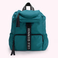 Teal Lulu Guinness backpack with black straps and accents.