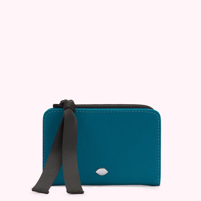 Teal zippered wallet with black ribbon detail and silver lip logo.